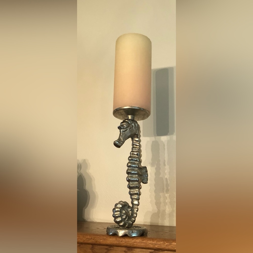 Cast iron sea horse candle holder, 9” inches tall, candle not included.